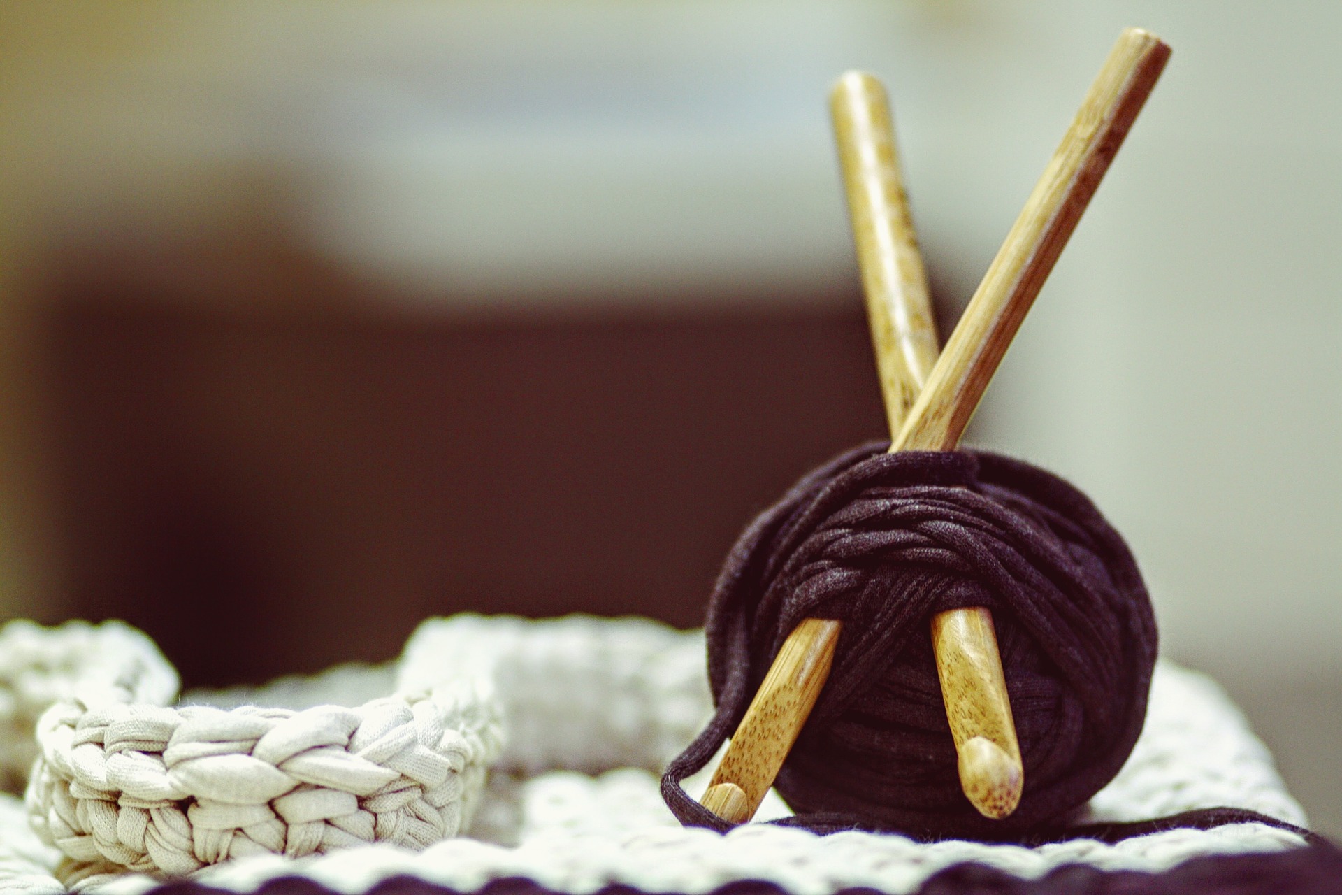 Ball of yarn with crochet hooks