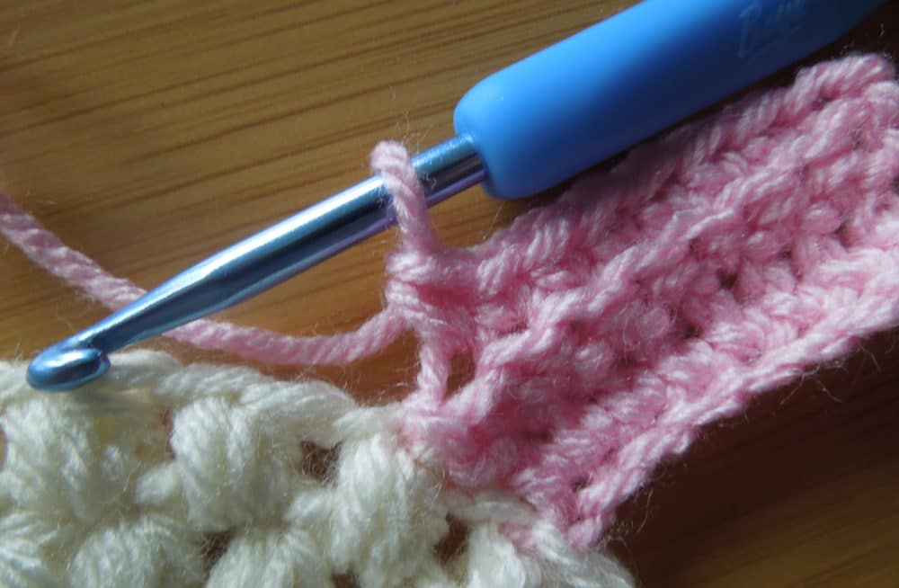 Sc in BLO, slip stitch in next stitch on hat