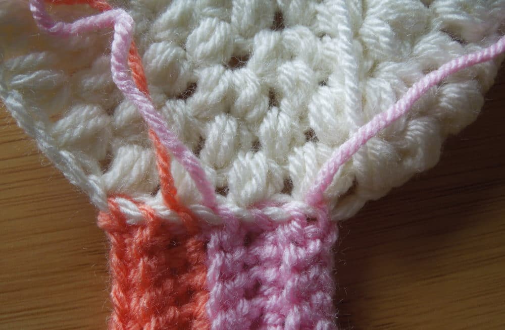 Rainbow Easter Bonnet Hat knotting different colors together