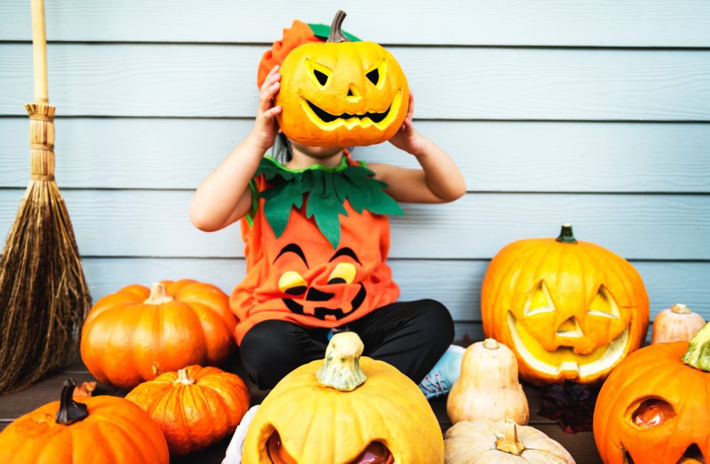 Kids with Jack-O-Lantern | Ultimate Halloween Guide | Marching North