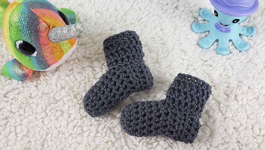 Baby booties with Narwhal and Octopus toys | Marching North