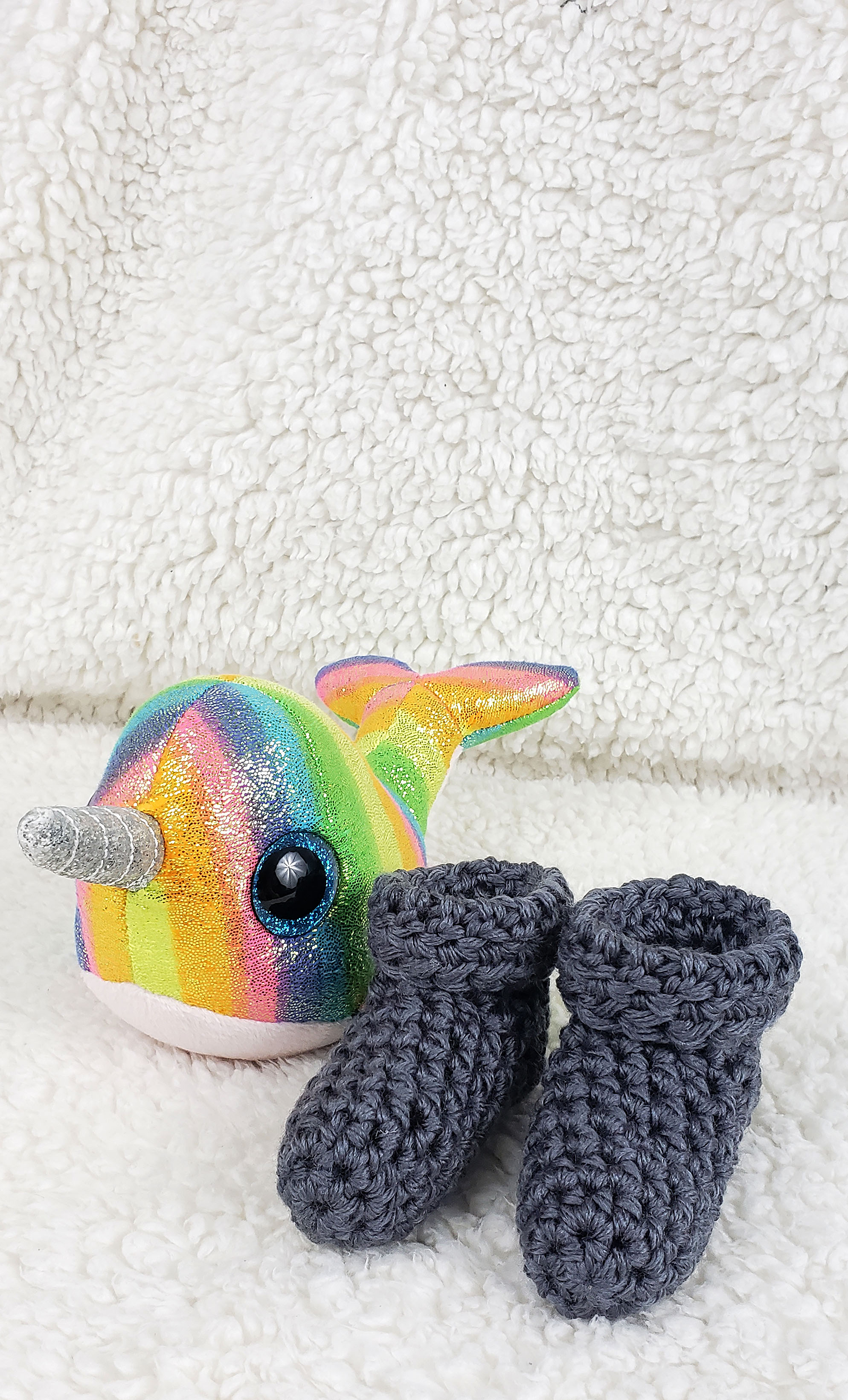 Crochet baby booties with Rainbow Narwhal | Marching North
