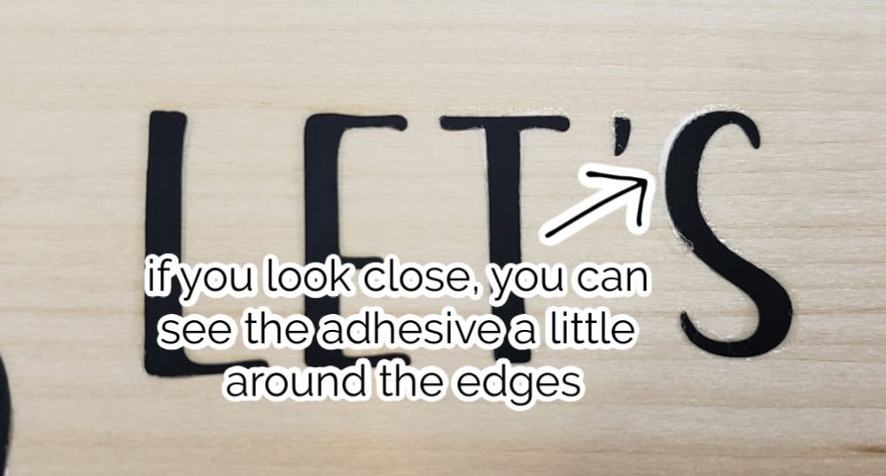 close up of adhesive showing around edges | HTV on wood | Marching North