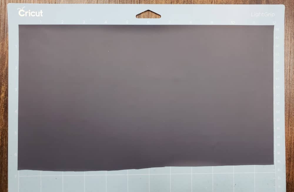 smooth the vinyl onto your mat | HTV on wood tutorial