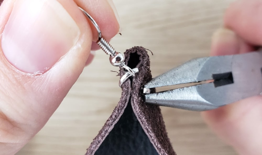 Insert ear hook through jump ring