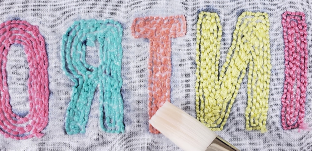 Use the paintbrush to spread out the glue