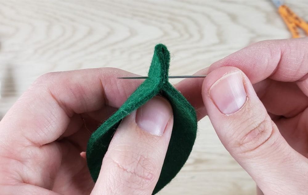 Insert needle into bottom of leaf