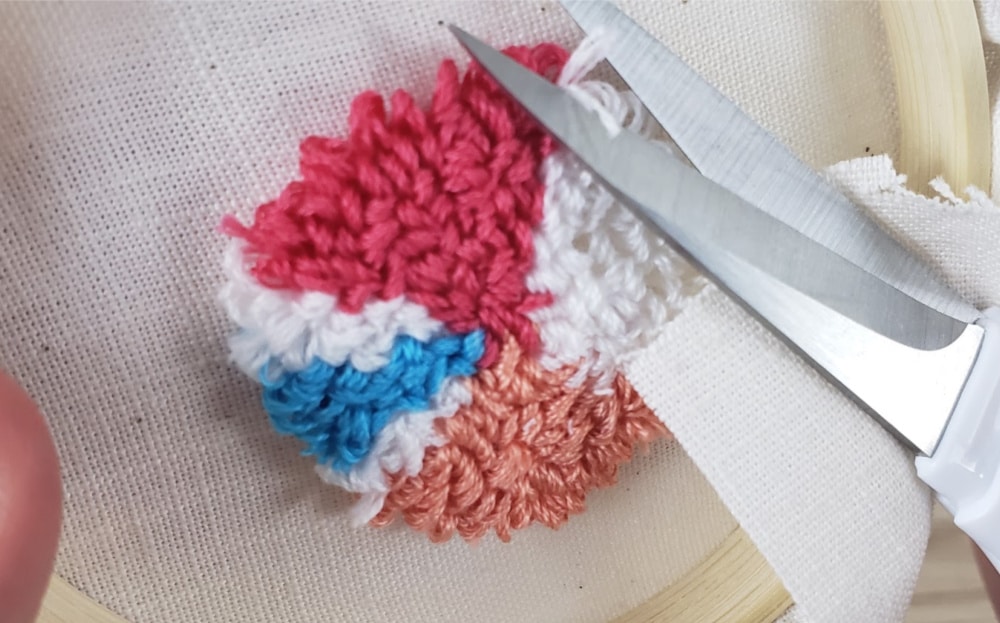 Trim any long threads on the front of your DIY Punch Needle Earring