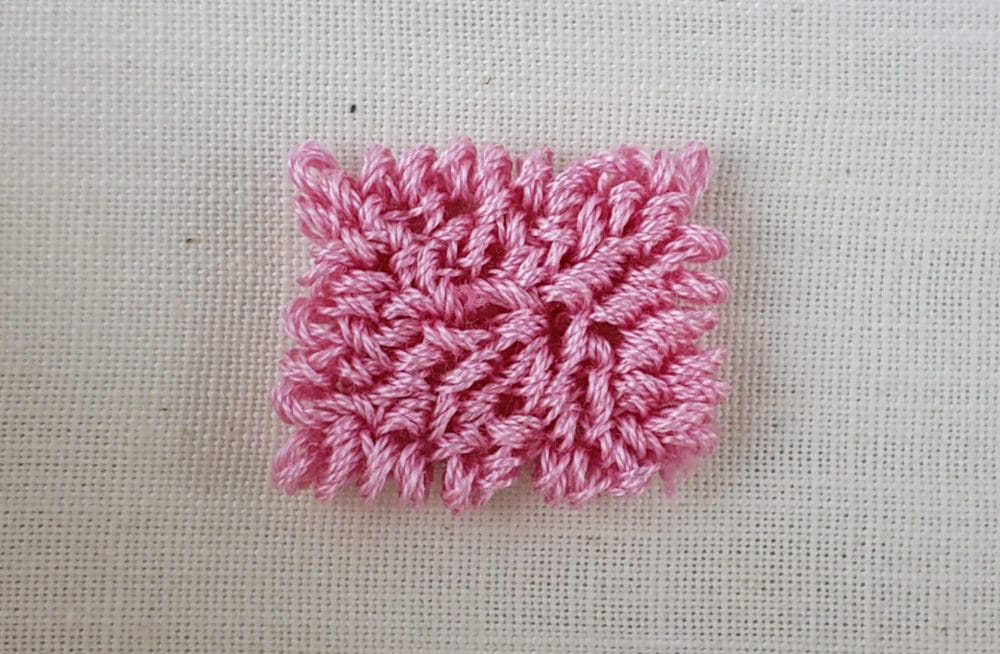 Filled in punch needle shape