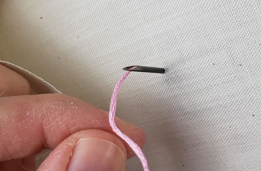 pull thread to the other side