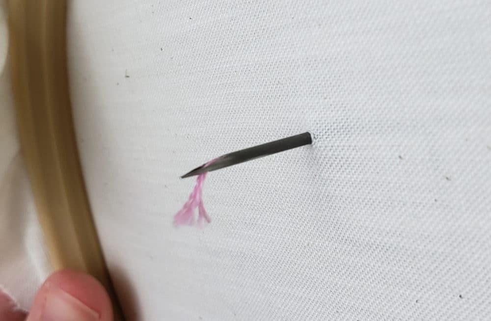 Shorten the thread thats sticking out