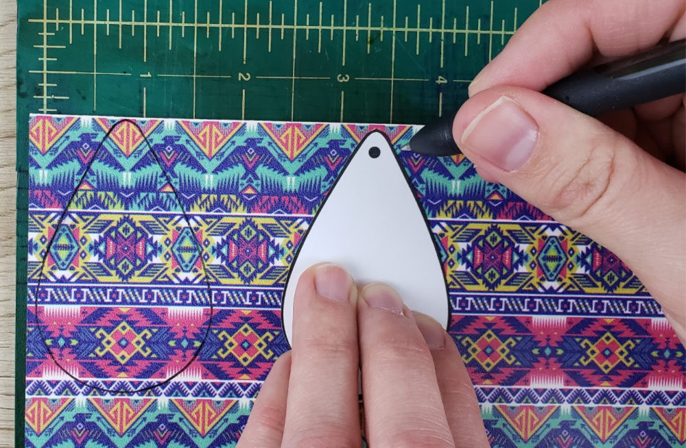 Outline the other leather earring