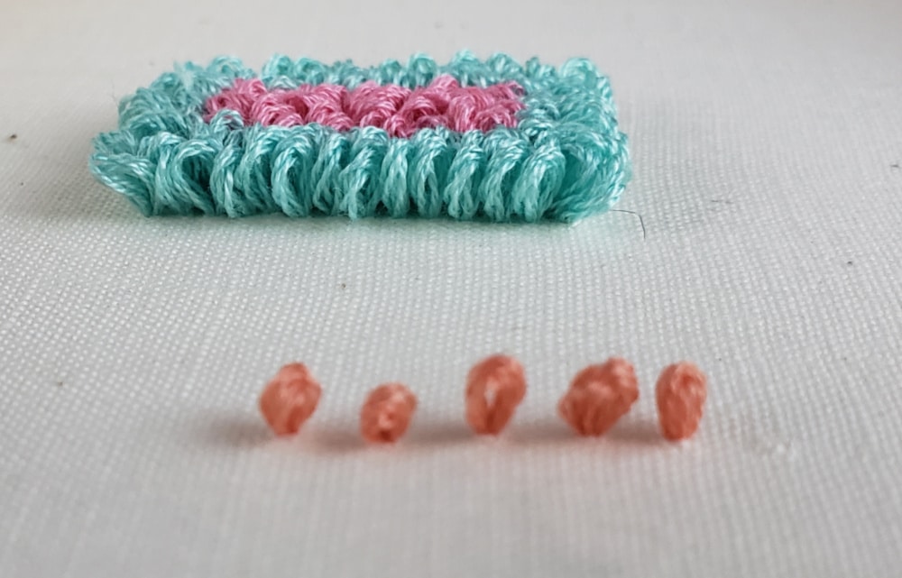 Uneven mini loops on the back from pulling the needle up too high