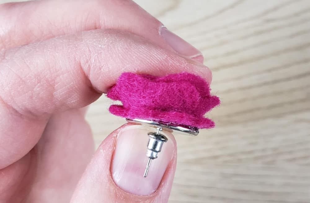 Still holding the felt rose and bezel on the bottom
