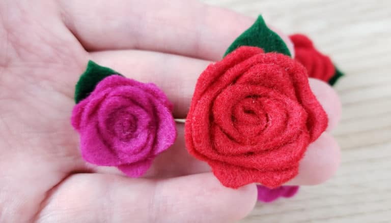 Two different sizes of felt rose earrings