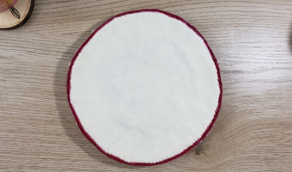 Back of the punch needle trivet
