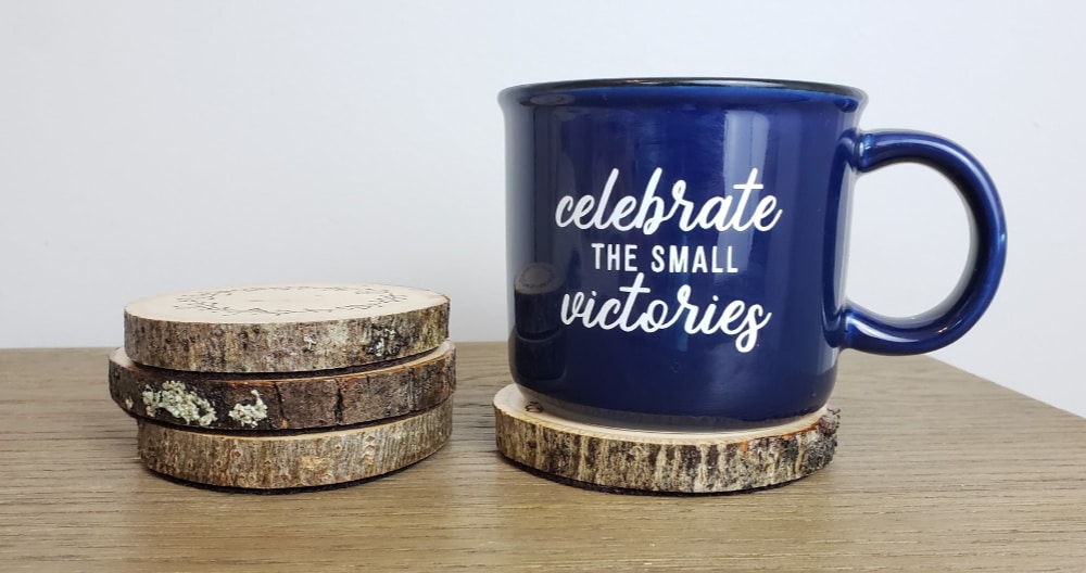 Wood burned coasters in use