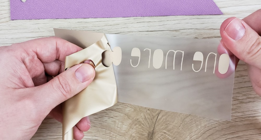 Weeding HTV for DIY Leather bookmarks