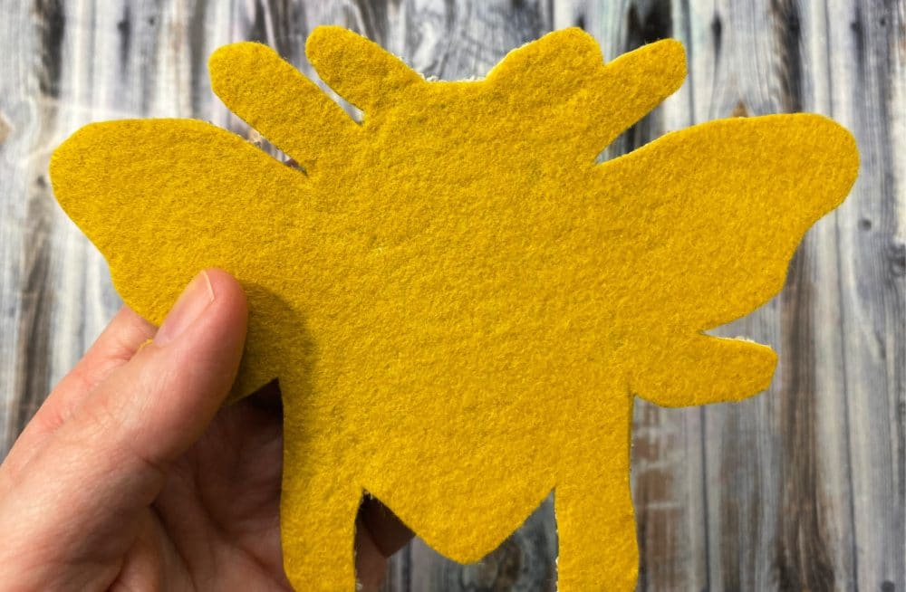 cut out the punch needle bee ornament