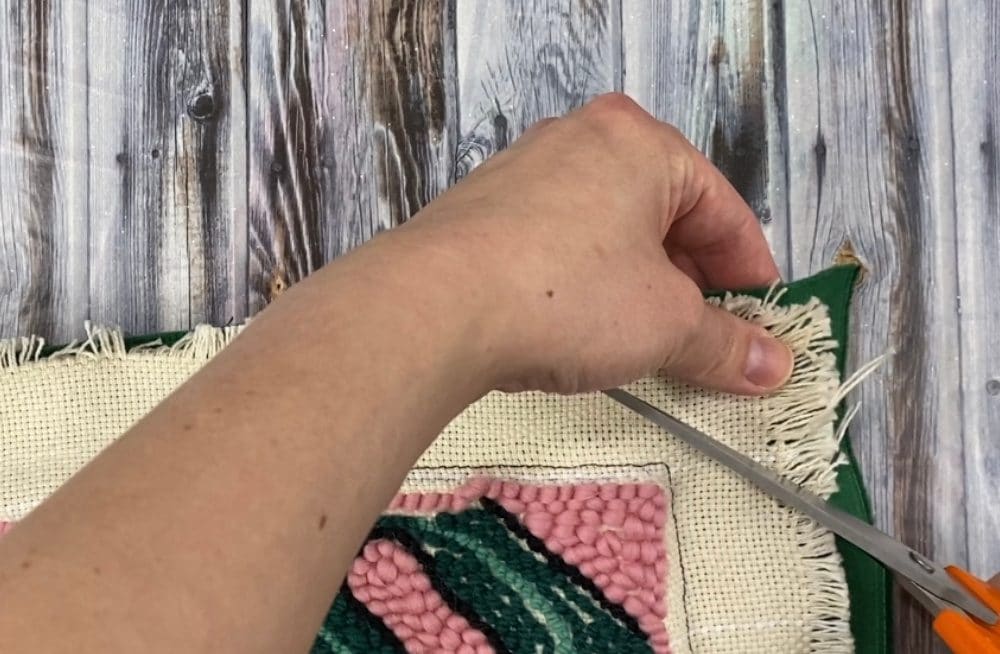 cut extra corner fabric off on a diagonal