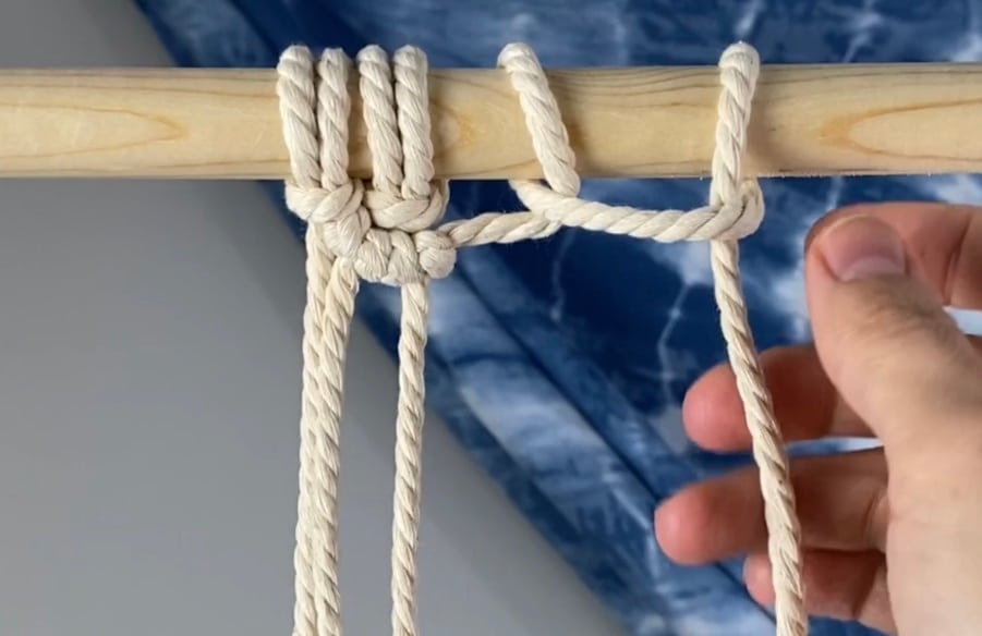 Attach it to the dowel with a larks head knot