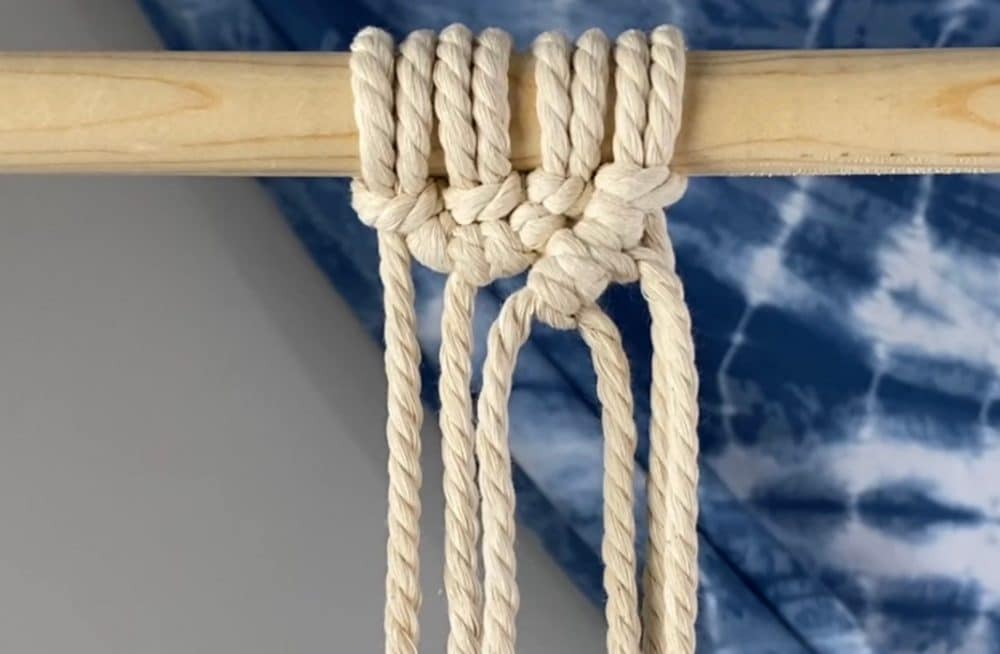 Make two double half hitch knots to the left