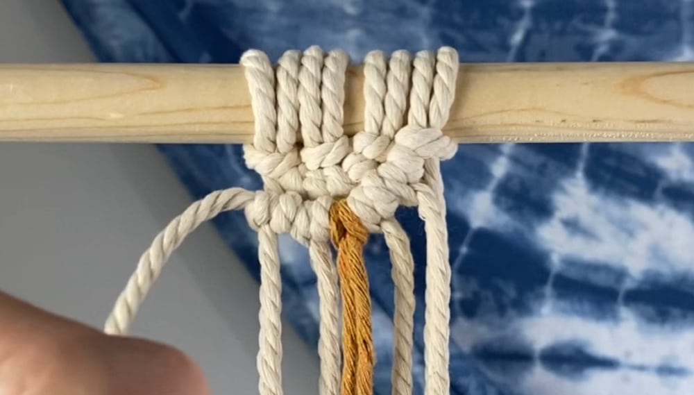 Make two more double half hitch knots to the left