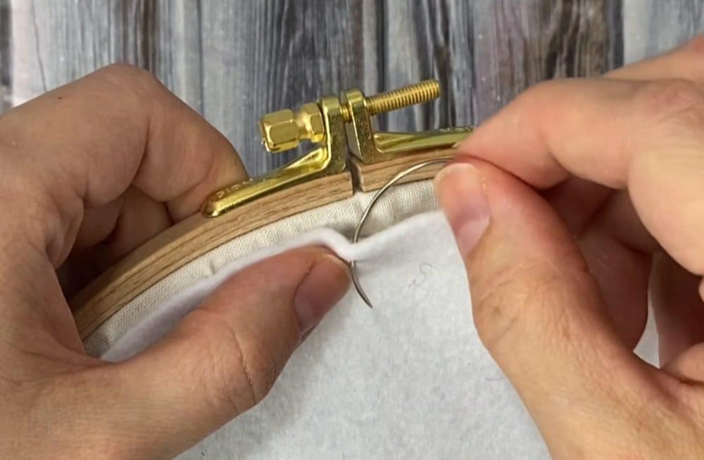 whip stitch around the hoop