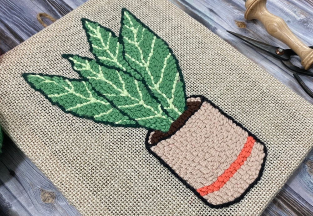 Snake plant mounted on a frame | finishing punch needle projects