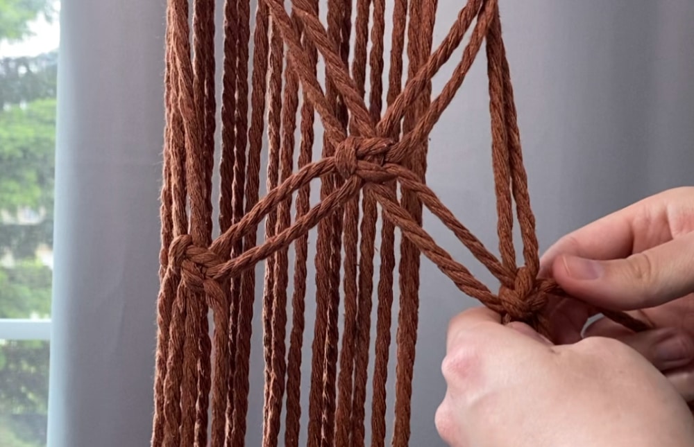 Tie three alternating square knots to make the plant holder part