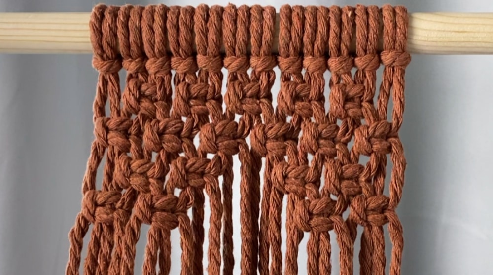 Make a diamond shape with square knots