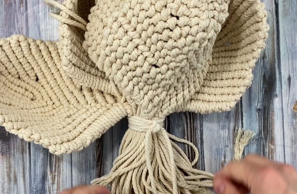 tie a knot to make it more secure
