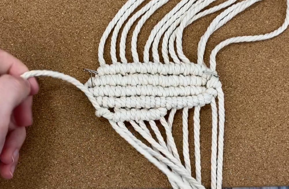 Tie a row of double half hitch knots in the other direction