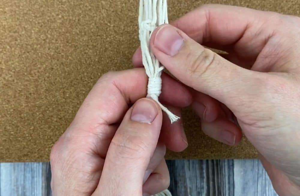 finish the mini macrame plant hanger with a wrapping knot