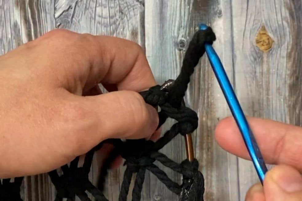 Pulling the rope through with a crochet hook