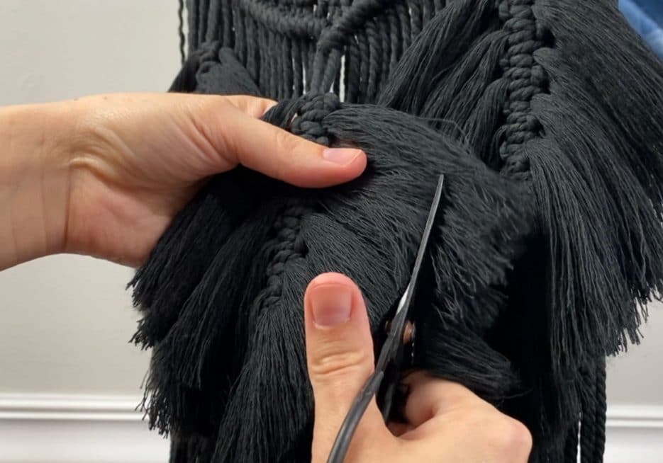 Trimming up the feathers | macrame dream catcher
