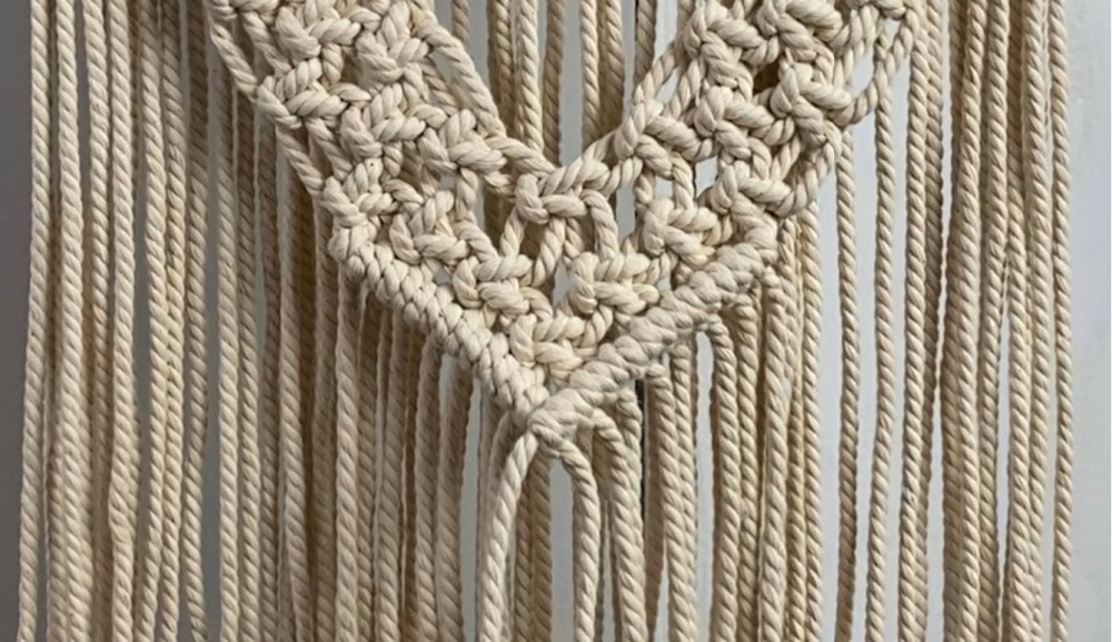 Tie a row of double half hitch knots | DIY Macrame Wall Hanging Tutorial