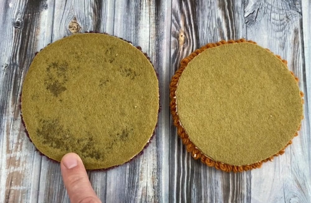 don't put too much glue on the back of the coasters or it bleeds through the felt