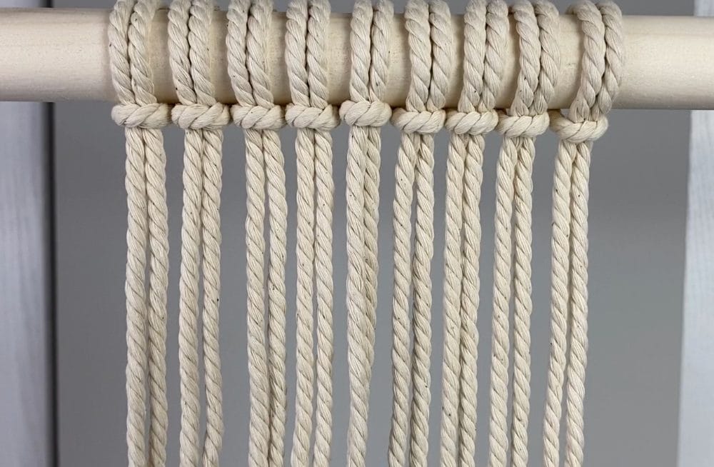 attach filler cords to the dowel | macrame ghost