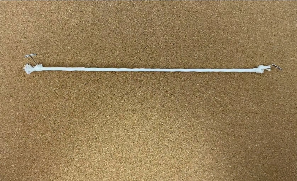 pin your holding cord to your cork board