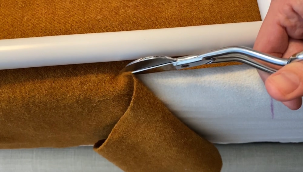 trim off the excess fabric on the bottom