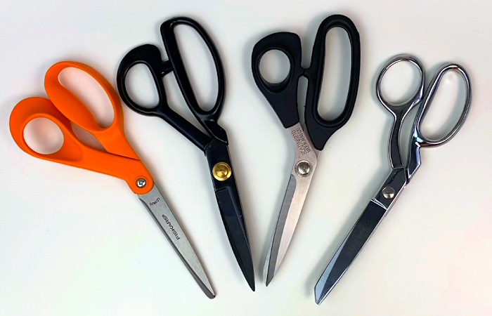 four pairs of scissors