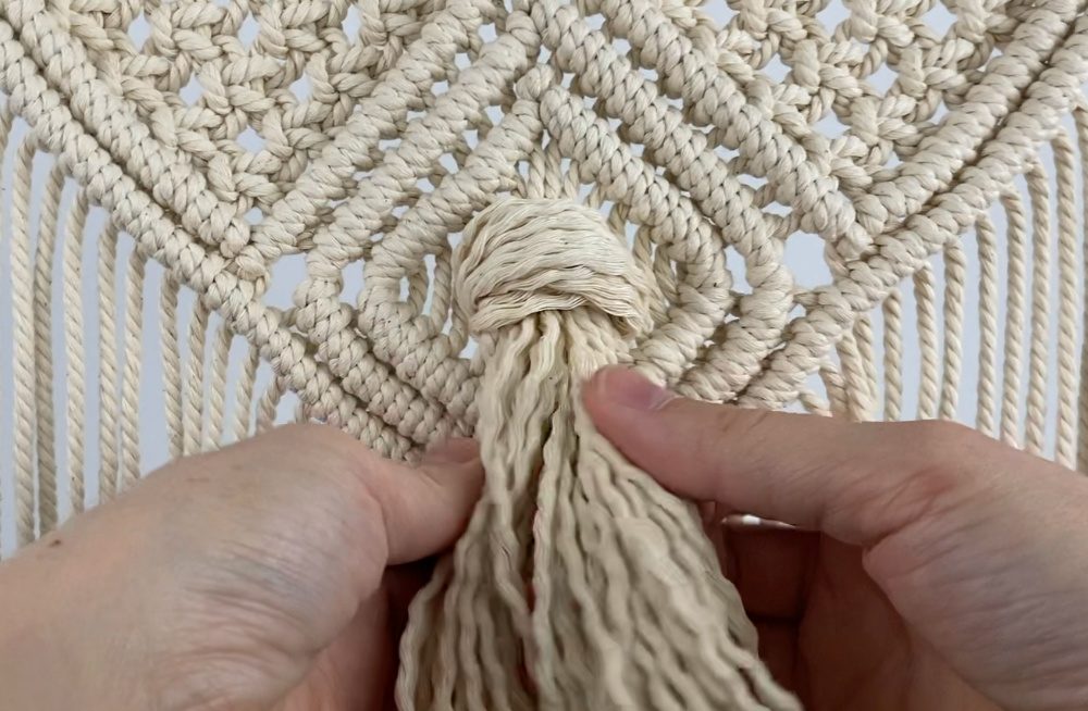attach the tassel using a rya knot