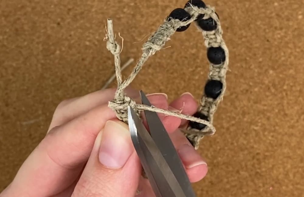 finishing the sliding square knot closure to macrame bracelet