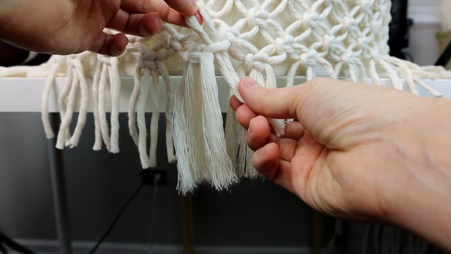 adding more fringe in between the sections on bottom of macrame lamp shade