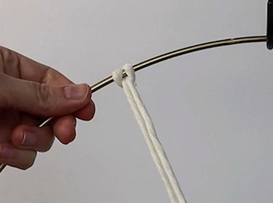 attach the cords to the metal ring with cow hitch knots 