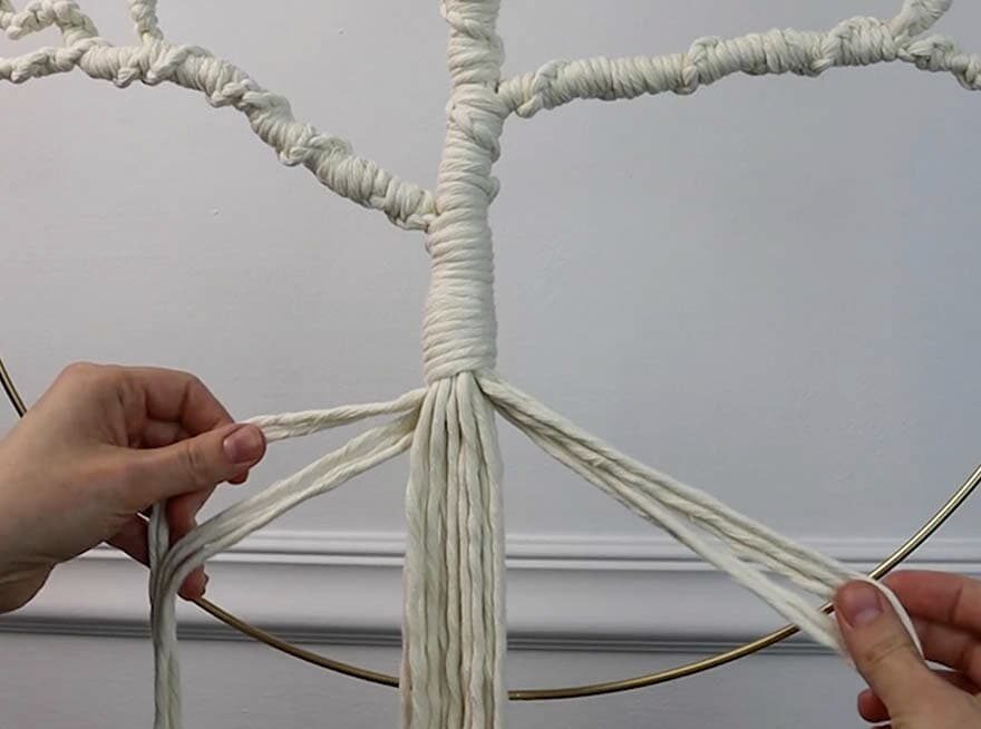 getting ready to attach the roots for macrame tree of life wall hanging
