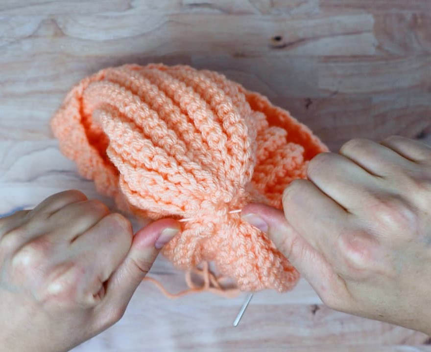 tying the beanie top nice and tight