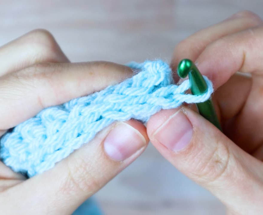 holding the two sides of the rectangle together for seaming