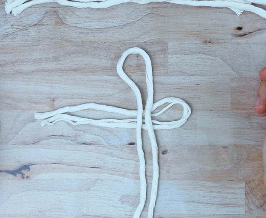 lay the center cord out and lay a short piece under it folded in half